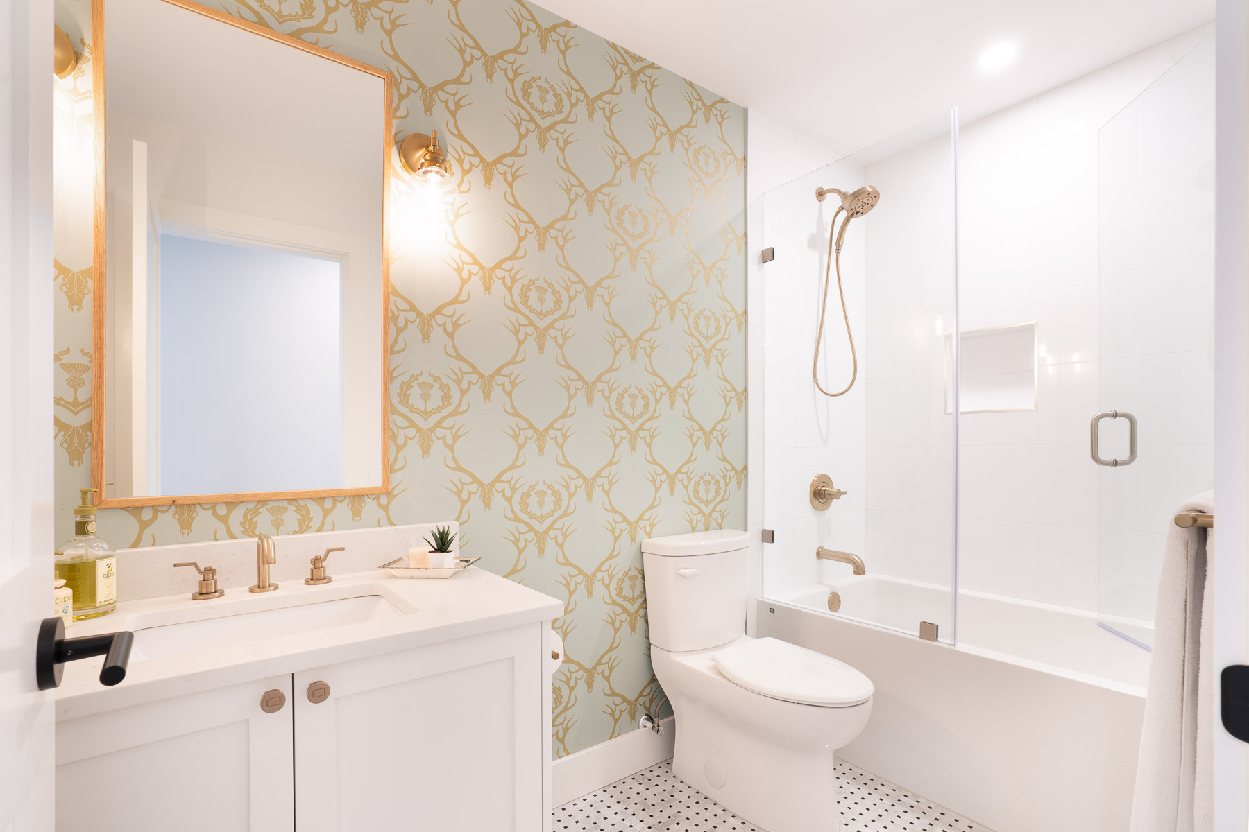 Coquitlam remodel bathroom with wallpaper and feature tile floors