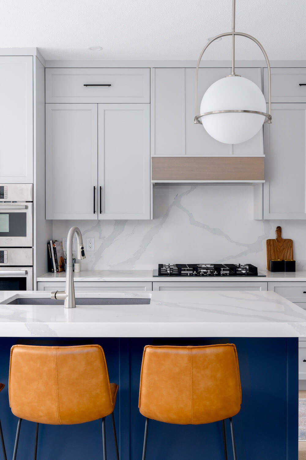 grey cabinetry with blue island